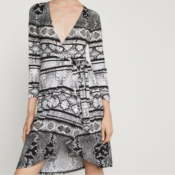 BCBGMaxAzria Dresses & Skirts - BCBG Black and White Patterned Wrap Dress